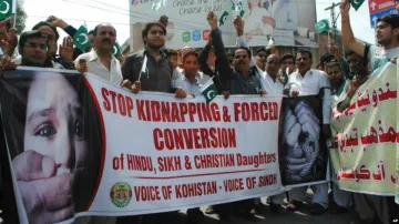 Pakistani civil society activists rally for protection of Hindu girls at a protest in Hyderabad, Pak