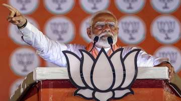 Prime Minister Narendra Modi addresses a public meeting for the Lok Sabha elections, in Pratapgarh.