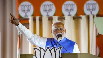 Prime Minister Narendra Modi addresses a public meeting in support of BJP candidates for Lok Sabha polls, at Dwarka in New Delhi.