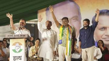 Congress leader Rahul Gandhi with party candidates JP Aggarwal, Udit Raj and Kanhaiya Kumar during a rally for Lok Sabha elections, in New Delhi.