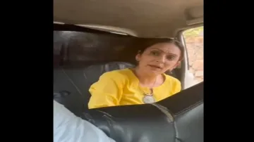 A woman passenger engages in verbal spat with her cab driver