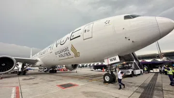 A Singapore airline aircraft is seen on the tarmac after requesting an emergency landing at Bangkok'