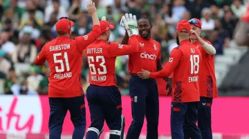 Jofra Archer celebrates a wicket with his England teammates.