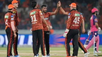 T Natarajan celebrates a wicket with his SRH teammates.