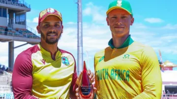 Brandon King and Rassie van der Dussen with the series trophy.