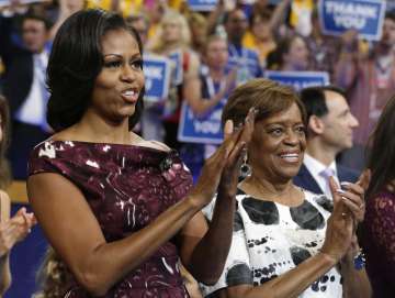 Former First Lady Michelle Omaba (L)