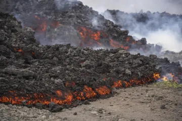 Iceland lava flow engulfs road