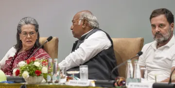 Congress President Mallikarjun Kharge with party leaders Sonia Gandhi and Rahul Gandhi during the extended Congress Working Committee meeting