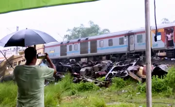 Damaged rail coach after the accident in Siliguri