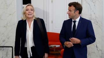 French President Emmanuel Macron, right, meets French far-right Rassemblement National (National Ral