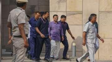 Delhi Chief Minister Arvind Kejriwal is surrounded by security personnel (File)