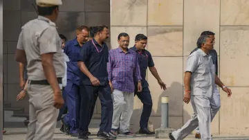 Delhi Chief Minister Arvind Kejriwal is surrounded by security personnel (File)