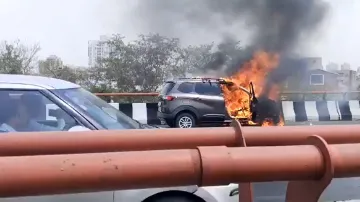 Car catches fire near Noida's ISKCON Temple