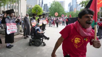 Pro-Palestinian protesters and allies demonstrate near the US consulate in Toronto