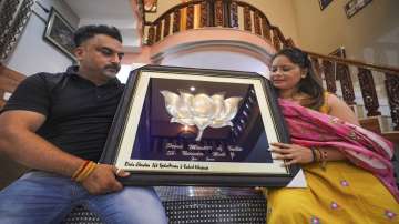 Modi cabinet oath ceremony, Jammu jeweller crafts silver lotus flower, bjp lotus symbol, Narendra Mo