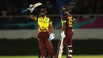 Nicholas Pooran celebrates his fifty.