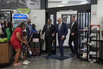 US President Joe Biden at a store.