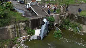 The wreckage of a car whose driver lost his way fell into a sewage canal and died due to heavy rain in Mexico.