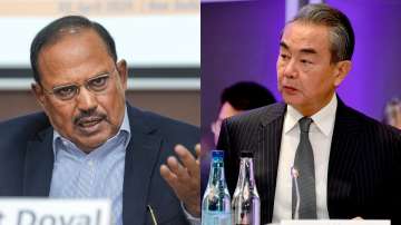 NSA Ajit Doval (L) and Chinese FM Wang Yi (R)