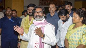 Jharkhand Chief Minister Hemant Soren with wife and Jharkhand Mukti Morcha (JMM) leader Kalpana Soren and others interacts with the media after assuming the charge of office after the swearing-in ceremony, in Ranchi.