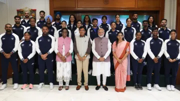 Olympics-bound Indian athletes with PM Modi.