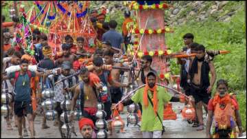 Kanwariyas after fetching water from Ganga river in Haridwar.