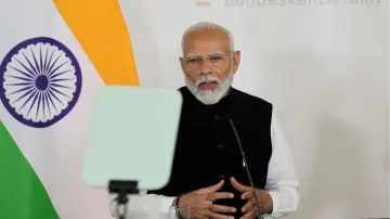 PM Modi speaks during a press conference with Austrian Chancellor Karl Nehammer