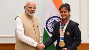 Prime Minister Narendra Modi and shooter Manu Bhaker