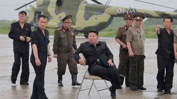 North Korean leader Kim Jong Un observes rescue efforts in flooded areas near the country's border w