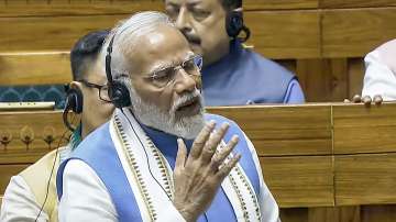 Prime Minister Narendra Modi replies to the Motion of Thanks on the Presidents Address in the Lok Sabha during the ongoing Parliament session, in New Delhi.