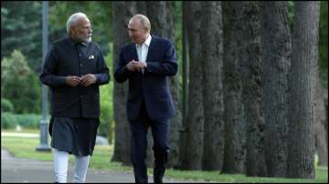 PM Modi and Vladimir Putin in Russia