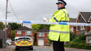 Police at the scene in Ashlyn Close, after an incident on Tuesday evening, in Bushey, Hertfordshire,