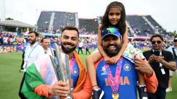 Rohit Sharma with daughter Samaira and teammate Virat.