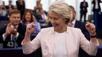 Ursula von der Leyen reacts after being chosen President of the European Commission for a second term, at the European Parliament in Strasbourg