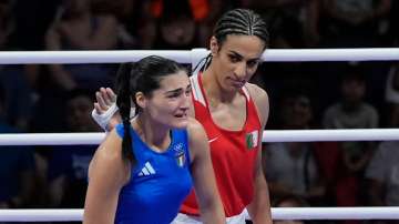 Algeria's Imane Khelif offers a bit of support for Ilaty's Angela Carini, who couldn't stop her tears after abandoning her bout in just 46 seconds