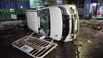 A vandalised Kolkata Police vehicle is seen amid protest at the RG Kar Medical College and Hospital against the alleged rape and murder of a trainee doctor inside the hospital premises, in Kolkata