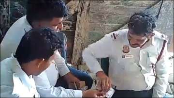 Delhi traffic police bribe distribution viral video