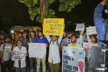 Members of various Resident Doctors’ Associations protest during candle march against alleged rape and murder of a woman doctor at Kolkata’s RG Kar Medical College and Hospital.