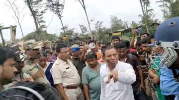 Snapshot from viral video in which minister Akhil Giri is seen threatening a forest official