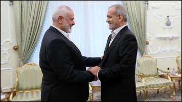 Hamas chief Ismail Haniyeh (Left) with Iranian President Masoud Pezeshkian (Right).