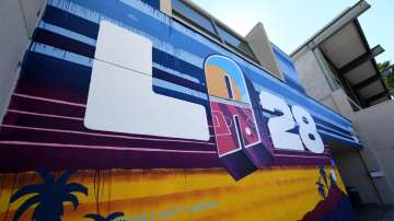 A mural reveals the new LA28 logo.