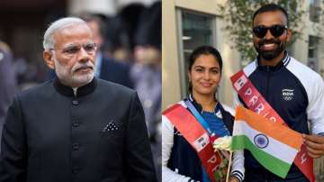 PM Narendra Modi and Indian athletes Manu Thaker, PR Sreejesh