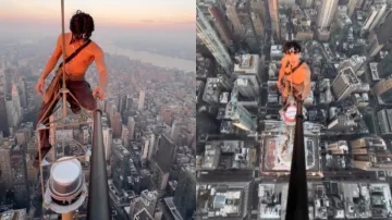 Man performs a stunt on top of NYC's Empire State Building