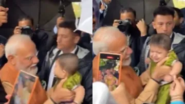 Video of PM Modi playing with an infant in Poland