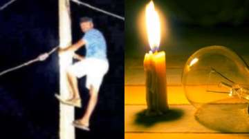 Angry Telengana man climbs pole to restore electricity