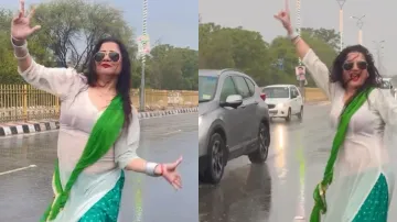 Woman dances amid speeding cars