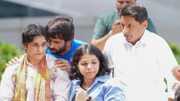 Vinesh Phogat with Bajrang Punia, Sakshi Malik and Deepender Hooda.