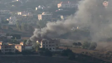 Smoke rises from the southern Lebanese town of Khiam, amid ongoing cross-border hostilities between 