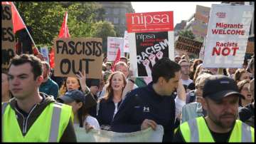 Protesters attend an anti-immigration protest in Belfast, Northern Ireland.