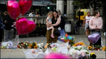 A vigil held for the three deceased children in Southport, England.